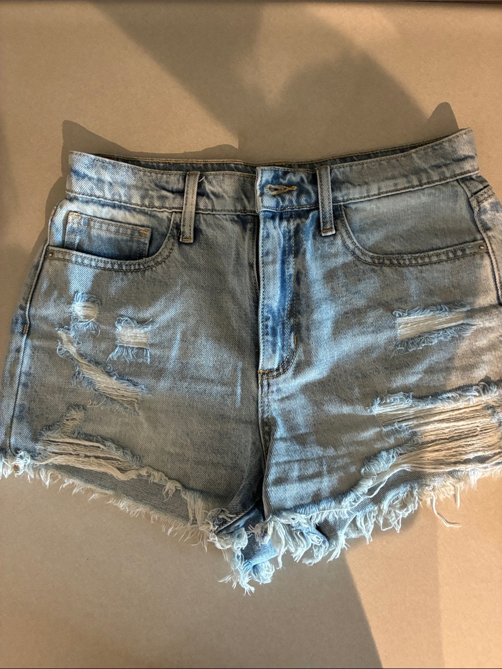 Altar'd State Light Wash Ripped Denim Cutoff Shorts